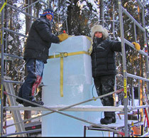 Heather Brown and Steve Brice pose infront of a large ice block, World Ice Art Championships, 2007.