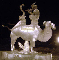 “New Song” ice sculpture of a camel and snake charmer, Ice Alaska 2007, photo by Steve Iverson.
