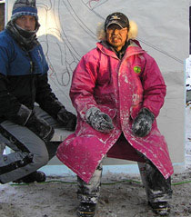 Junichi Nakamura, ice sculptor, sitting with Peter Slavin. AT the 2007 World Ice Art Championships, in Fairbanks, Alaska.